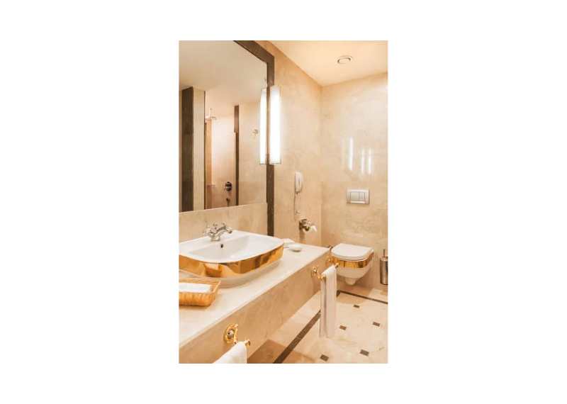 small bathroom white and gold