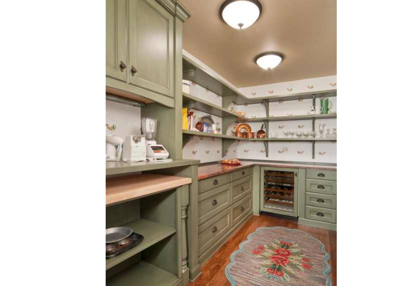 green cabinets with brass hardware