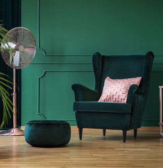 dark green velvet chair with ottoman