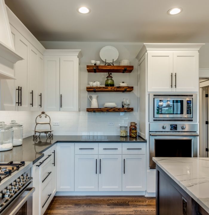 floating shelf between two cabinets